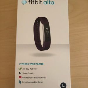 FITBIT ALTA PLUM  NEVER OPENED!